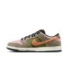 Nike SB Dunk Low Arts-Rec sneaker with pink, olive green, and cheetah print details, orange Swoosh, and black laces